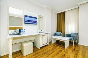 Deluxe Triple Room, 1 Bedroom, Desert View | Premium bedding, minibar, in-room safe, soundproofing
