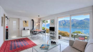 Family Apartment, 1 Bedroom, Microwave, Mountainside (Casa brighella Brissago with Lake) | Living area | TV