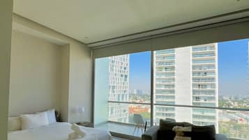 Standard Loft | Premium bedding, in-room safe, iron/ironing board, free WiFi