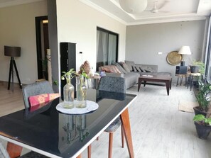 Deluxe Bungalow | Living room | 32-inch LCD TV with cable channels, TV - Islamabad Hill Hotel and Resort (Islamabad)