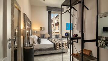 Deluxe Quadruple Room | 1 bedroom, minibar, blackout drapes, soundproofing