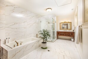 Rose Room | Bathroom | Jetted tub, rainfall showerhead, designer toiletries, hair dryer - Frederick Stearns House Historic Inn (Detroit)