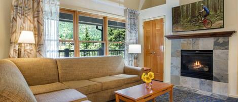 32-inch flat-screen TV with satellite channels, fireplace