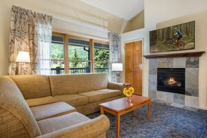 Loft, 1 Bedroom | Living area | 32-inch flat-screen TV with satellite channels, fireplace