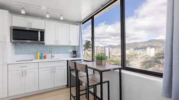 Fridge, microwave, stovetop, coffee/tea maker