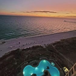 Sunset over looking tower 1 pool
