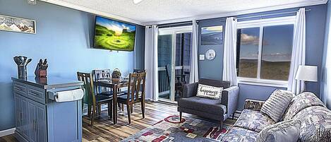 TV, fireplace, books