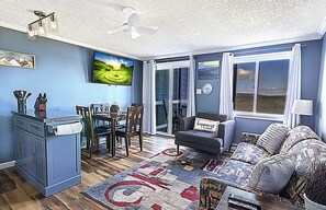 TV, fireplace, books