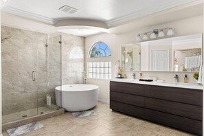 Bathtub, hair dryer, towels, soap