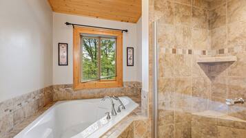 Combined shower/bathtub, jetted bath, towels, soap