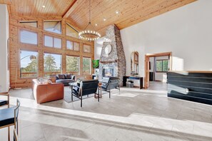 Smart TV, fireplace, foosball, books