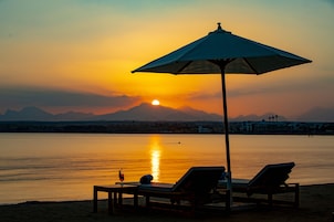 Private beach nearby, free beach shuttle, sun loungers, beach umbrellas