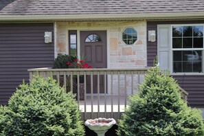A house with a porch, stone accents, and a bird bath. - Drive It Home, 5 minutes to CDP or Cooperstown (Cooperstown)