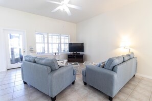 TV, fireplace, books, music library - Tides Edge in Treasure Beach - Pet Friendly (Saint Augustine)