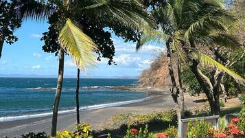 On the beach, sun loungers, beach towels
