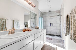 Bathtub, hair dryer, towels