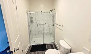 Shower, towels, soap, toilet paper