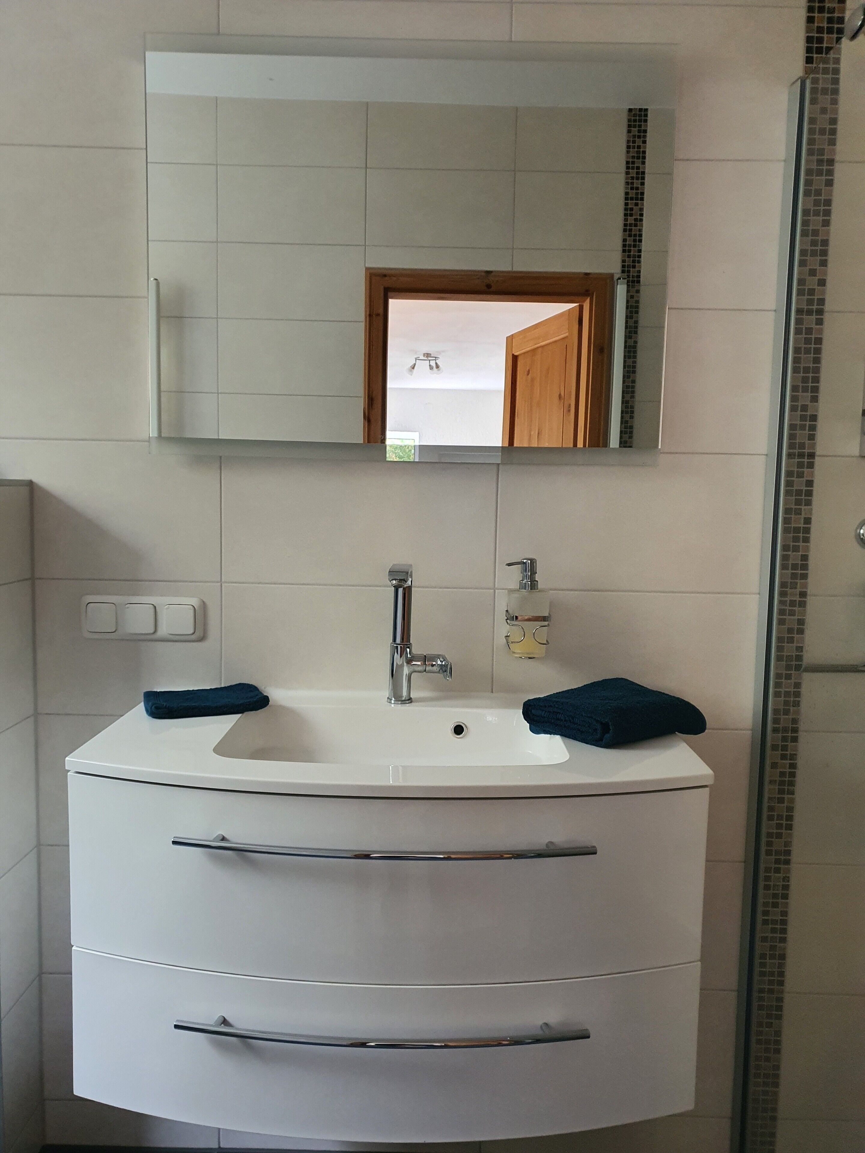 Shower, free toiletries, hair dryer, towels