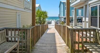 Coastal home with 2 community pools, bikes, front porch & balcony - near beach