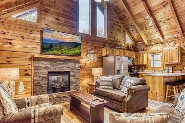 Sink into comfortable furnishings, by the gas fireplace, under beautiful light.