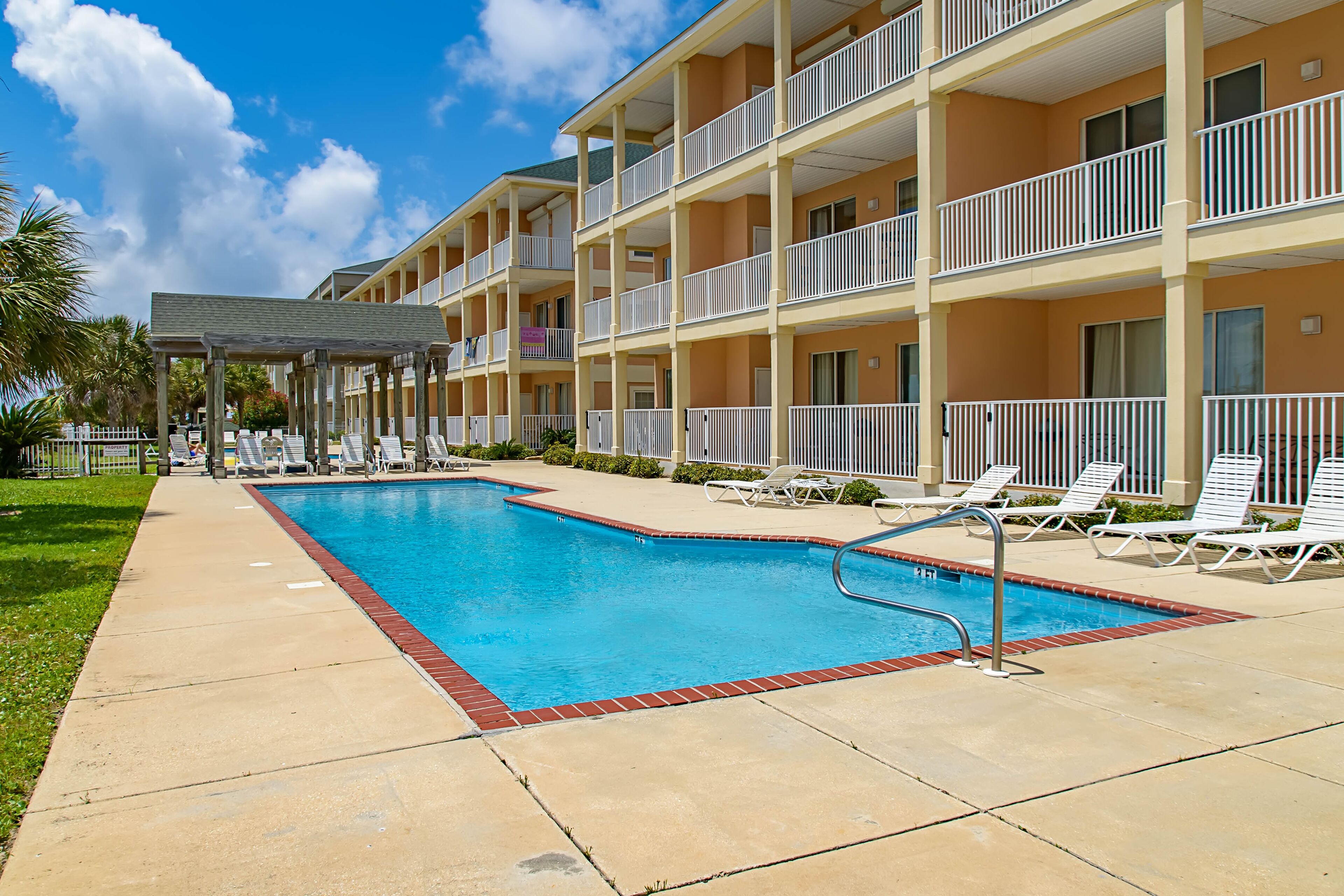 Gulf-front condo with beach access, pool views, outdoor pool, grills, W/D & AC