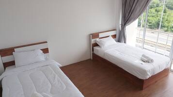 Basic Double or Twin Room, 2 Twin Beds, Shared Bathroom | 6 bedrooms, free WiFi, bed sheets
