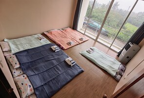 Economy Quadruple Room, Shared Bathroom, No Air Conditioner | Free WiFi