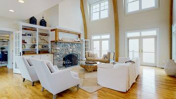 TV, fireplace, table football, books