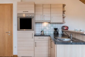 Réfrigérateur, four, plaque de cuisson, lave-vaisselle