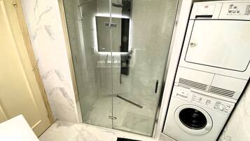 Shower, hair dryer, towels