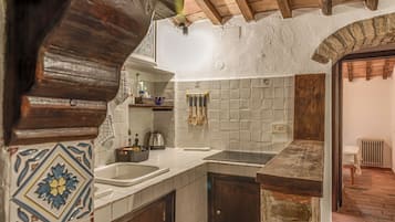Fridge, stovetop, electric kettle, toaster