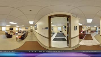 Economy Room | Living area | 14-inch TV with cable channels, first-run movies, pay movies