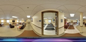 Economy Room | Living area | 14-inch TV with cable channels, first-run movies, pay movies