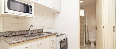 Fridge, microwave, oven, cookware/dishes/utensils