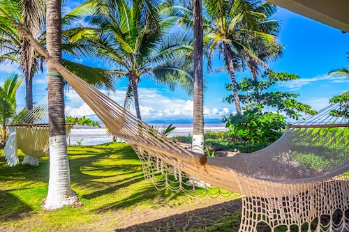 Beachfront dog-friendly home with private pool, grill, hammocks, & beach access