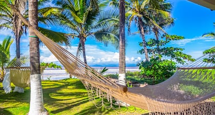 Beachfront dog-friendly home with private pool, grill, hammocks, & beach access