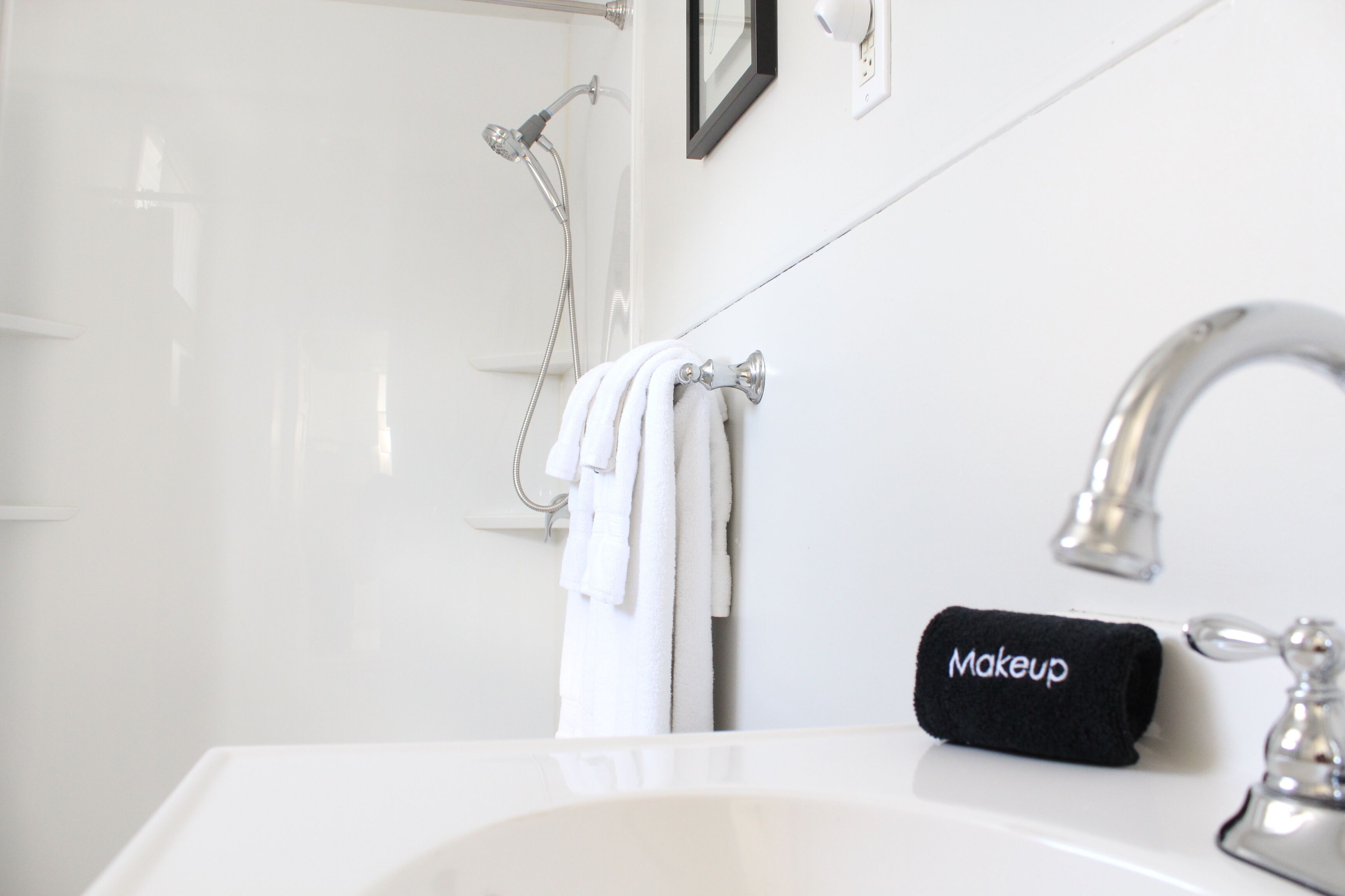 Combined shower/tub, hair dryer, towels, soap