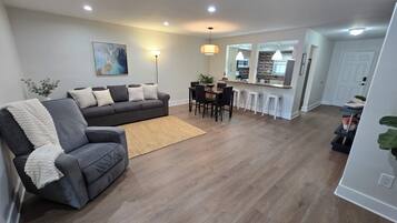 Luxurious & Spacious Townhouse | Living area | 58-inch Smart TV with digital channels, TV, video-game console