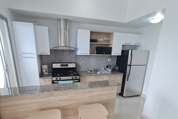 Comfort Apartment | Private kitchen | Full-size fridge, microwave, oven, stovetop