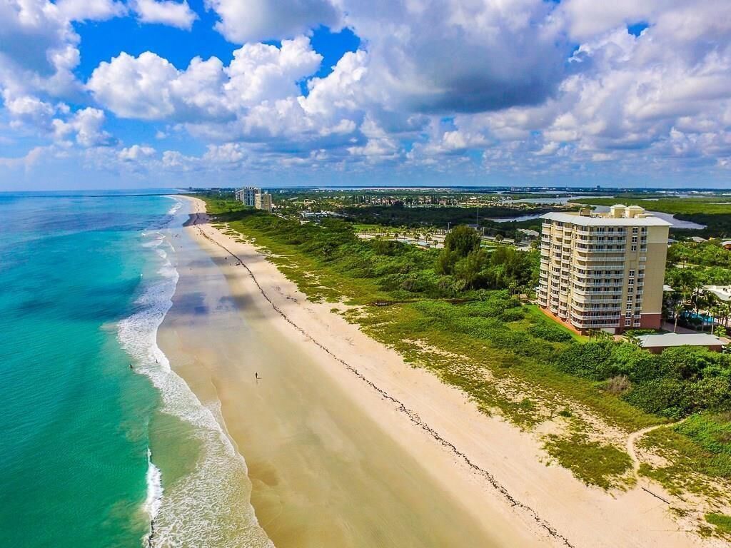 On the beach, sun loungers, beach towels