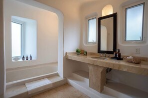 Bathtub, hair dryer, towels
