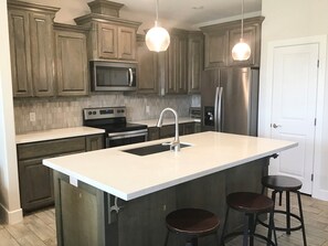 Fridge, microwave, stovetop, dishwasher