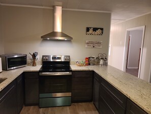 Fridge, microwave, oven, stovetop - sold property,  not available.  (Arcadia)
