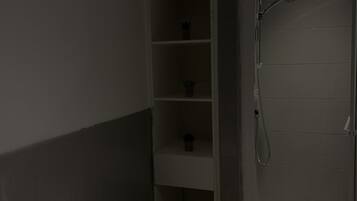 Combined shower/tub, hair dryer, towels, soap