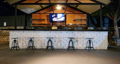 Stylish 5 bed 2.5 bath, with loft, pool table, amazing outdoor bar, kid playset.