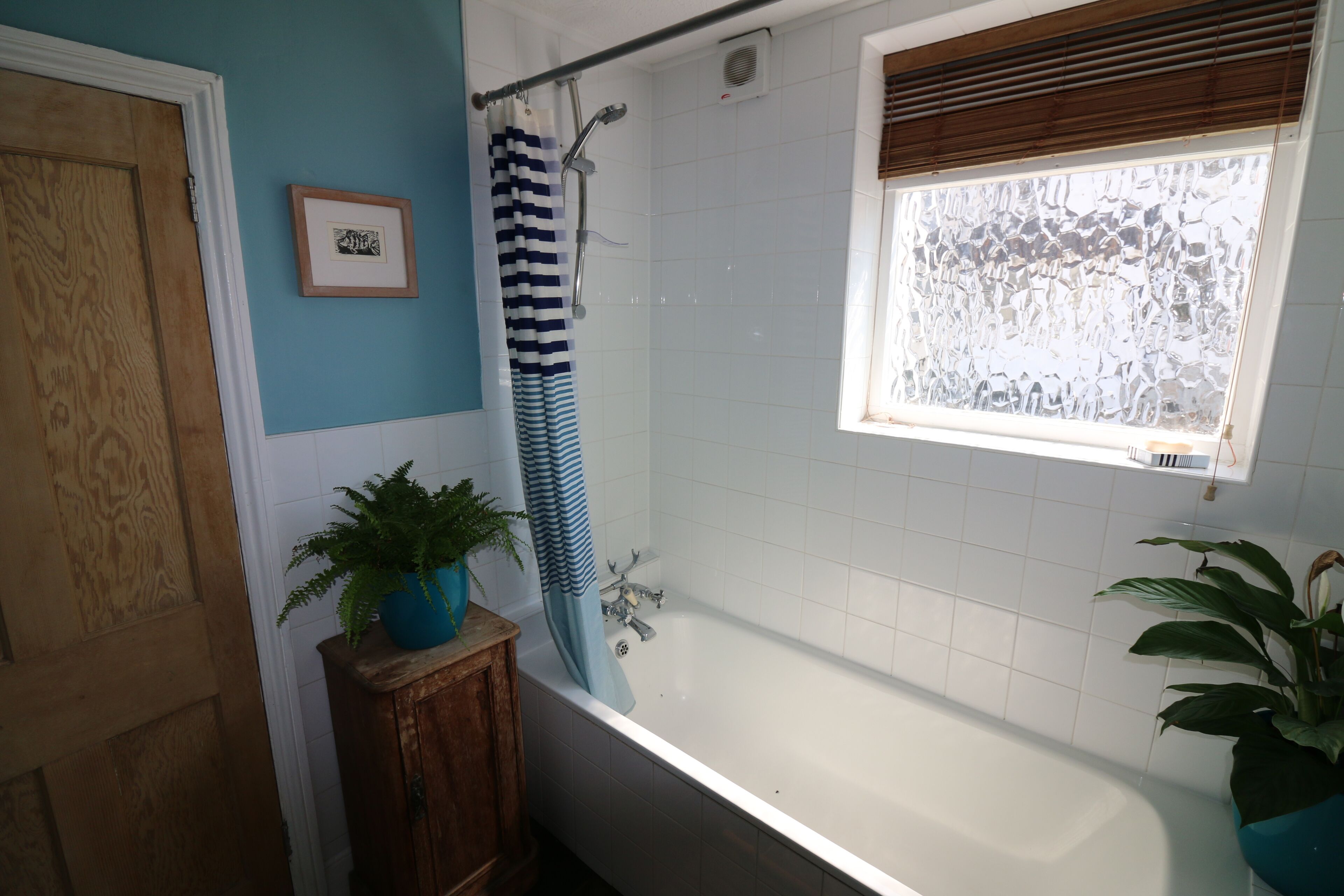 Combined shower/tub, hair dryer, towels, soap