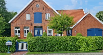 View of the dike & 50 m from the harbor and the North Sea
