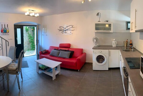 House | Living area | 30-inch TV with cable channels