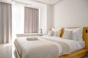 4 chambres, coffres-forts dans les chambres, fer et planche à repasser