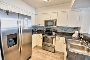 Condo, 3 Bedrooms | Private kitchen | Fridge, oven, stovetop, coffee/tea maker